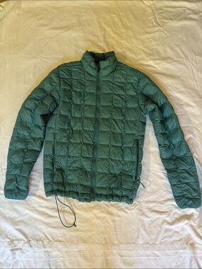 The North Face teal Quilted Puffer Jacket